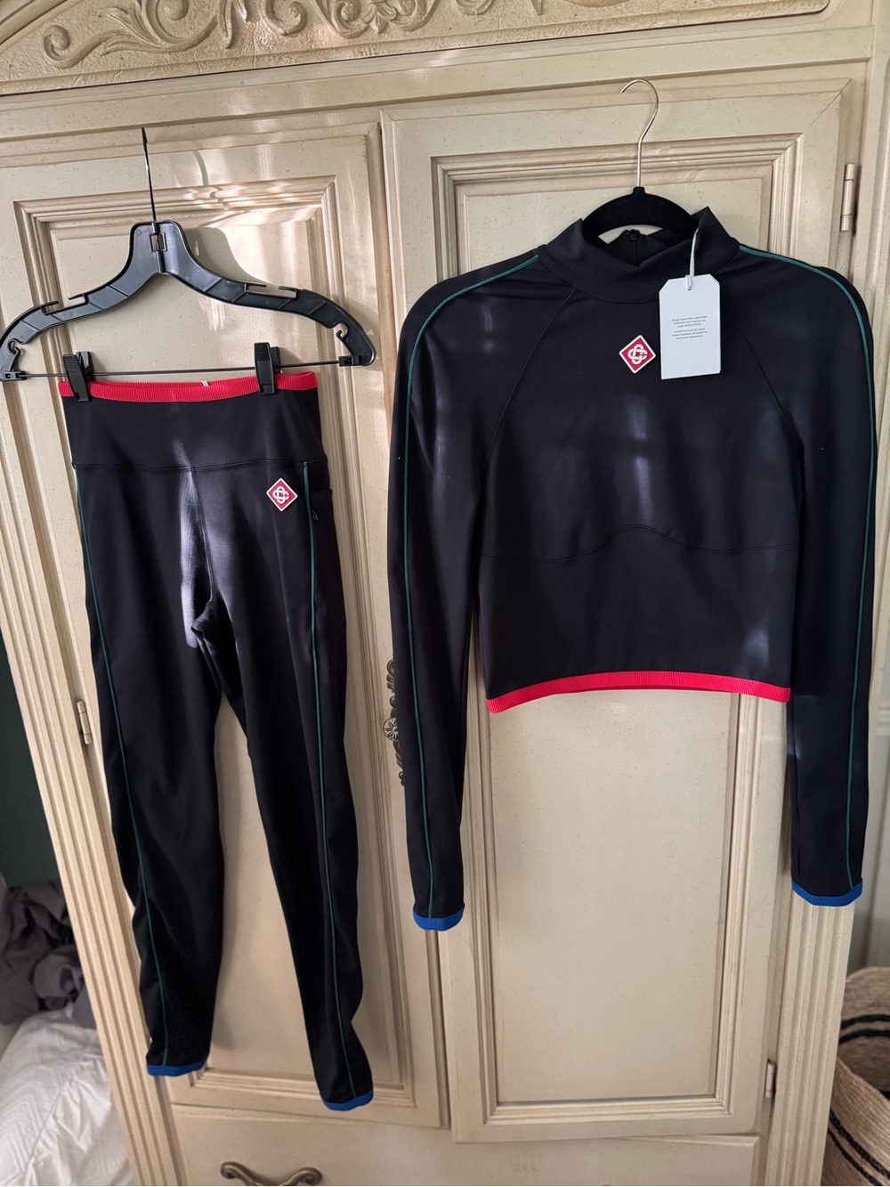 NWT - Black Athletic Two-Piece Set with Red Trim and Blue Cuffs